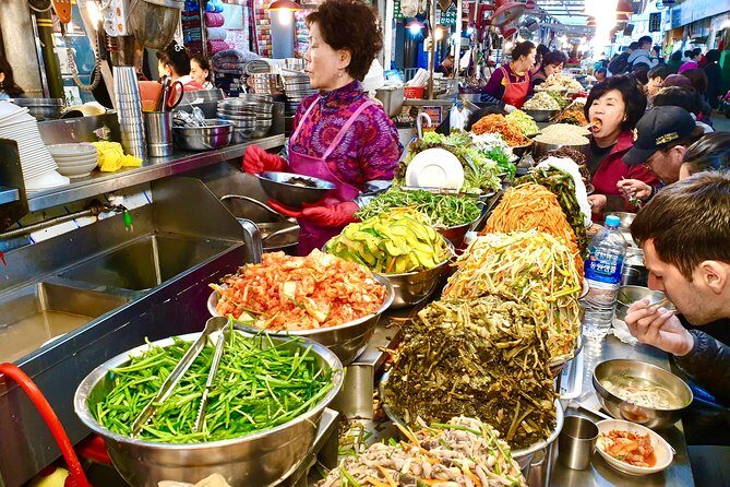 Downtown Seoul Guided Food & Market Tour with 8+ Local Tastings - N Seoul Tower stop: first landmark, first context (photo pause energy)