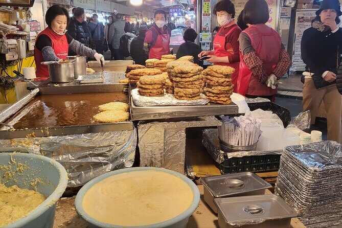 Private Seoul City Tour Palace, village, temple, market - Gwangjang Market: Korean textiles and the street food worth planning around