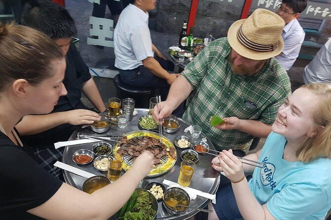 Seoul: Anthony Bourdain-Inspired BBQ and Pub Experience - Mapo District: Where Korean BBQ and Pub Culture Actually Fit Together