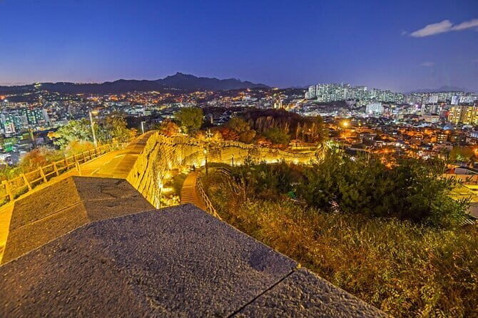 Seoul City Night View and Foodie Walking Tour - Naksan Park and the City Wall Walk (Plus Demon Hunters Fun)