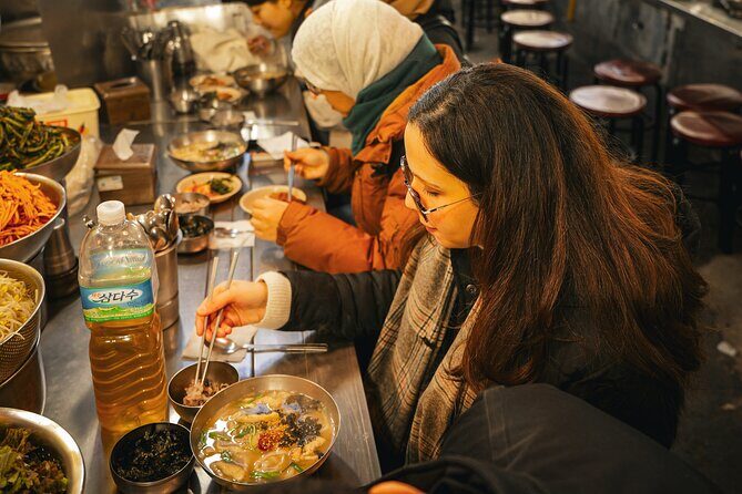 Seoul History Tour: Dark Past & Market Street Flavors - Seoul from Independence Gate: how the tour sets the mood