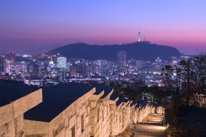Seoul Night Tour (Gwangjang Market, Royal Palace and Naksan Park) - Cheonggyecheon Stream at Night: A Central Seoul Walk With Soft Light