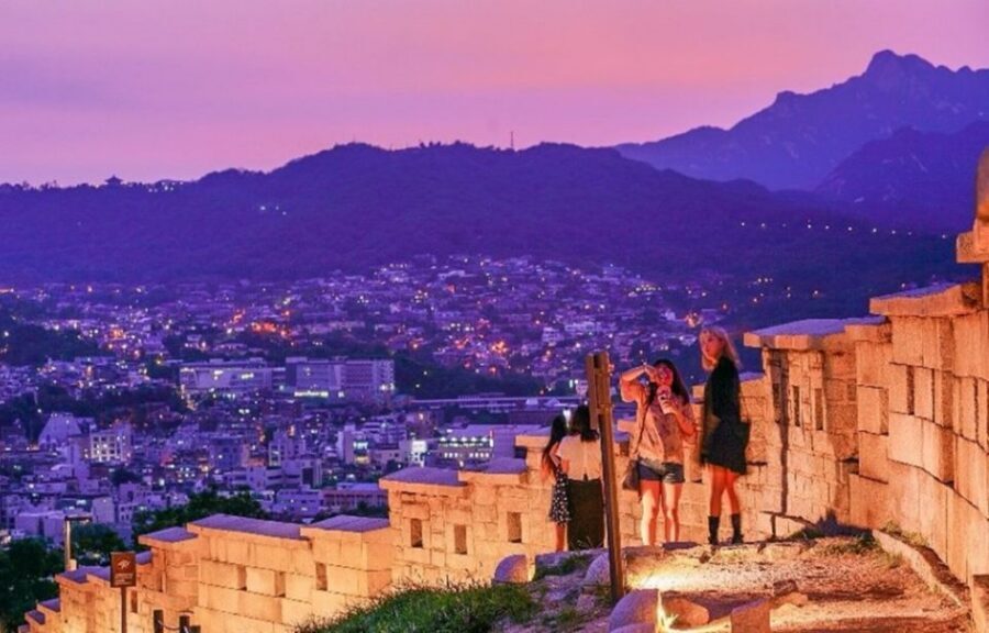 Seoul: Nighttime Tour of Palace, Market, Naksan Park & More - Seoul at night, planned for real life